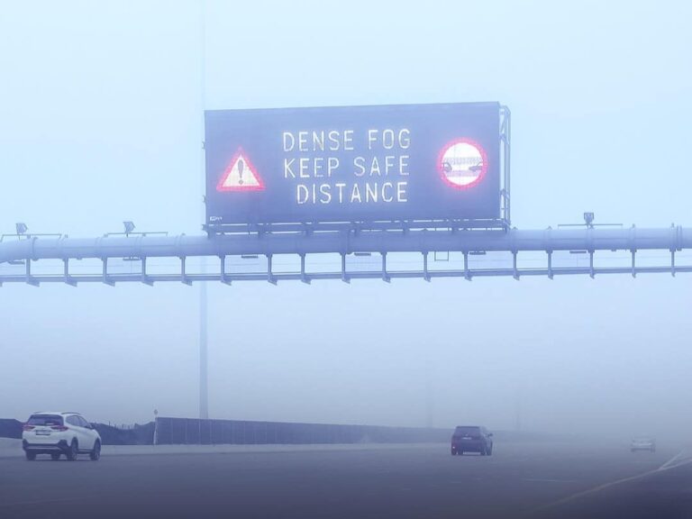 : Fog blankets Dubai skyline as motorists drive slowly during morning rush hour