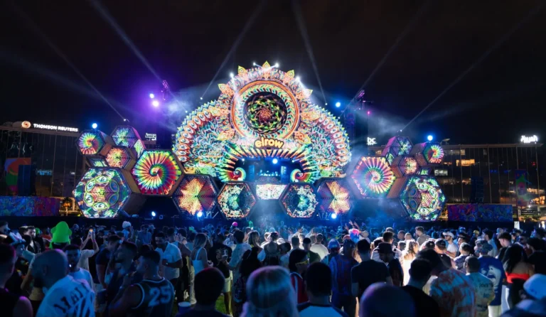 Crowds enjoying a night festival with lights in the UAE