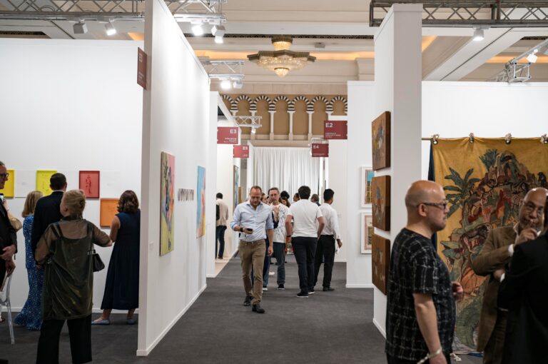 Visitors at a contemporary art exhibition in Dubai during the 2026 art season