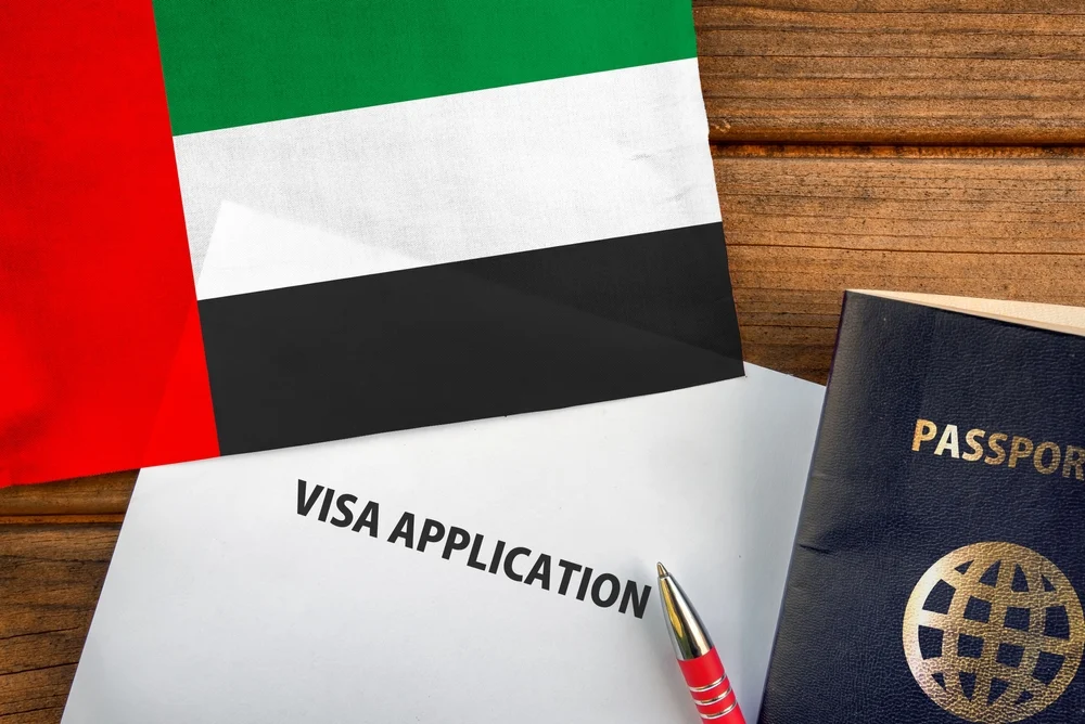 UAE immigration counters with travelers and residents completing visa formalities